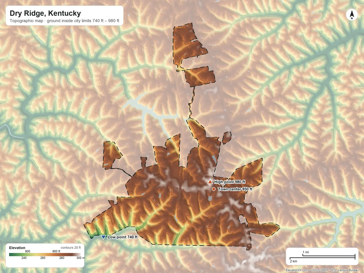 Topographic elevation map of Dry Ridge, Kentucky, shaded from 740 ft on the southwest side to 980 ft near the middle