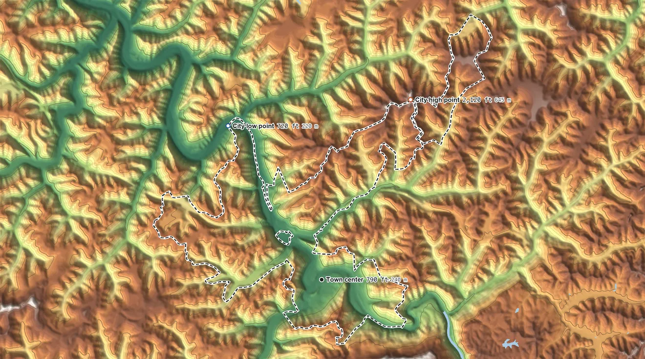 Topographic elevation map of Elkhorn City, Kentucky, shaded from 720 ft on the northwest side to 2,120 ft on the northeast side