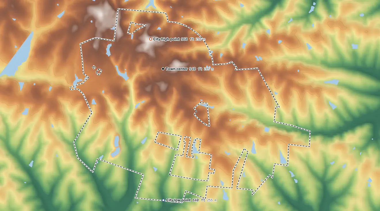 Topographic elevation map of Eminence, Kentucky, shaded from 840 ft on the south side to 960 ft on the northwest side
