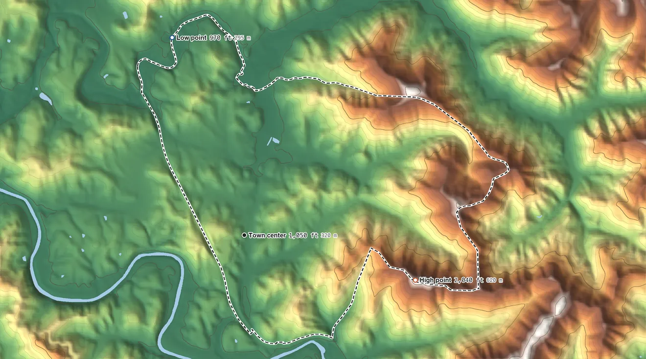 Topographic elevation map of Flat Lick, Kentucky, shaded from 970 ft on the north side to 2,040 ft on the east side