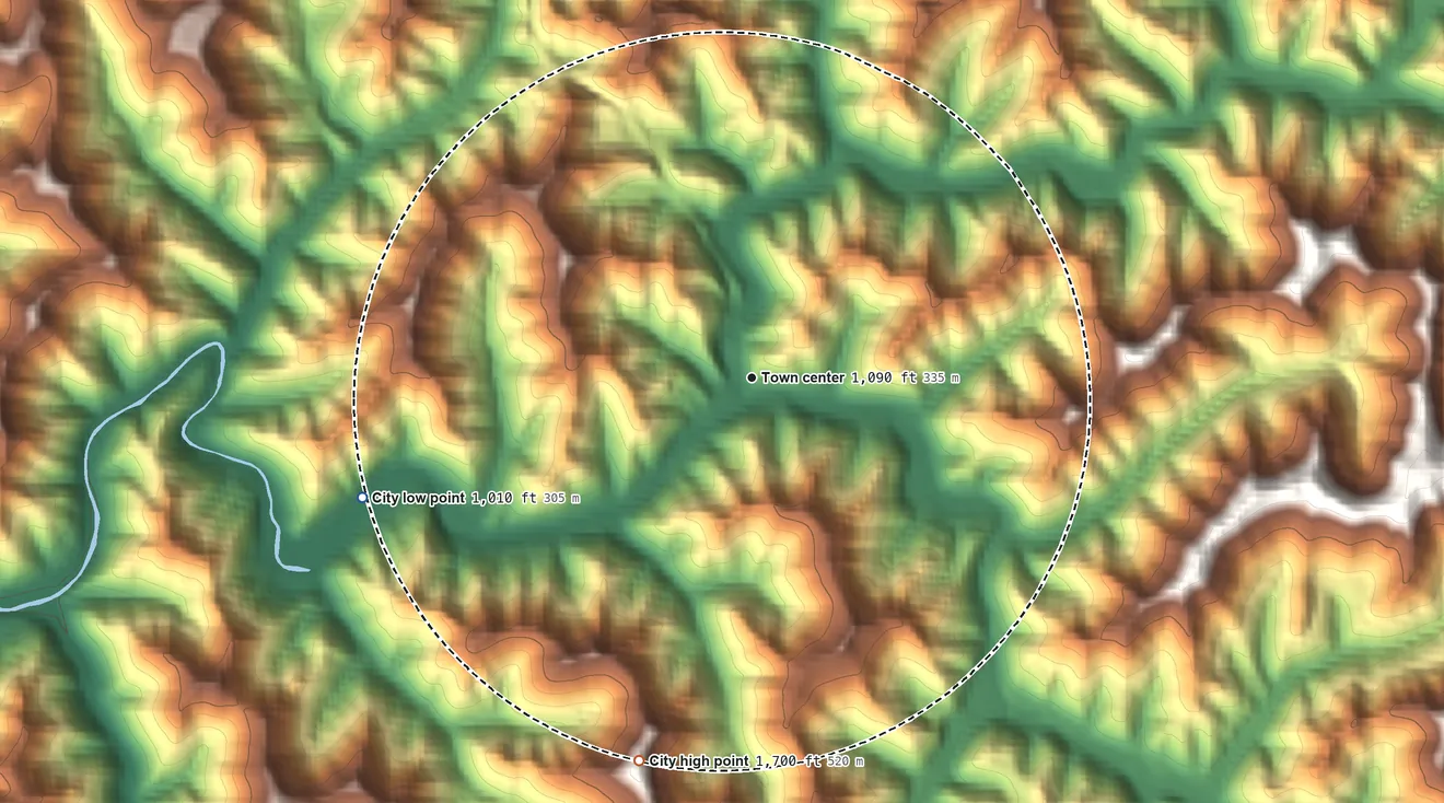 Topographic elevation map of Hindman, Kentucky, shaded from 1,010 ft on the west side to 1,700 ft on the south side