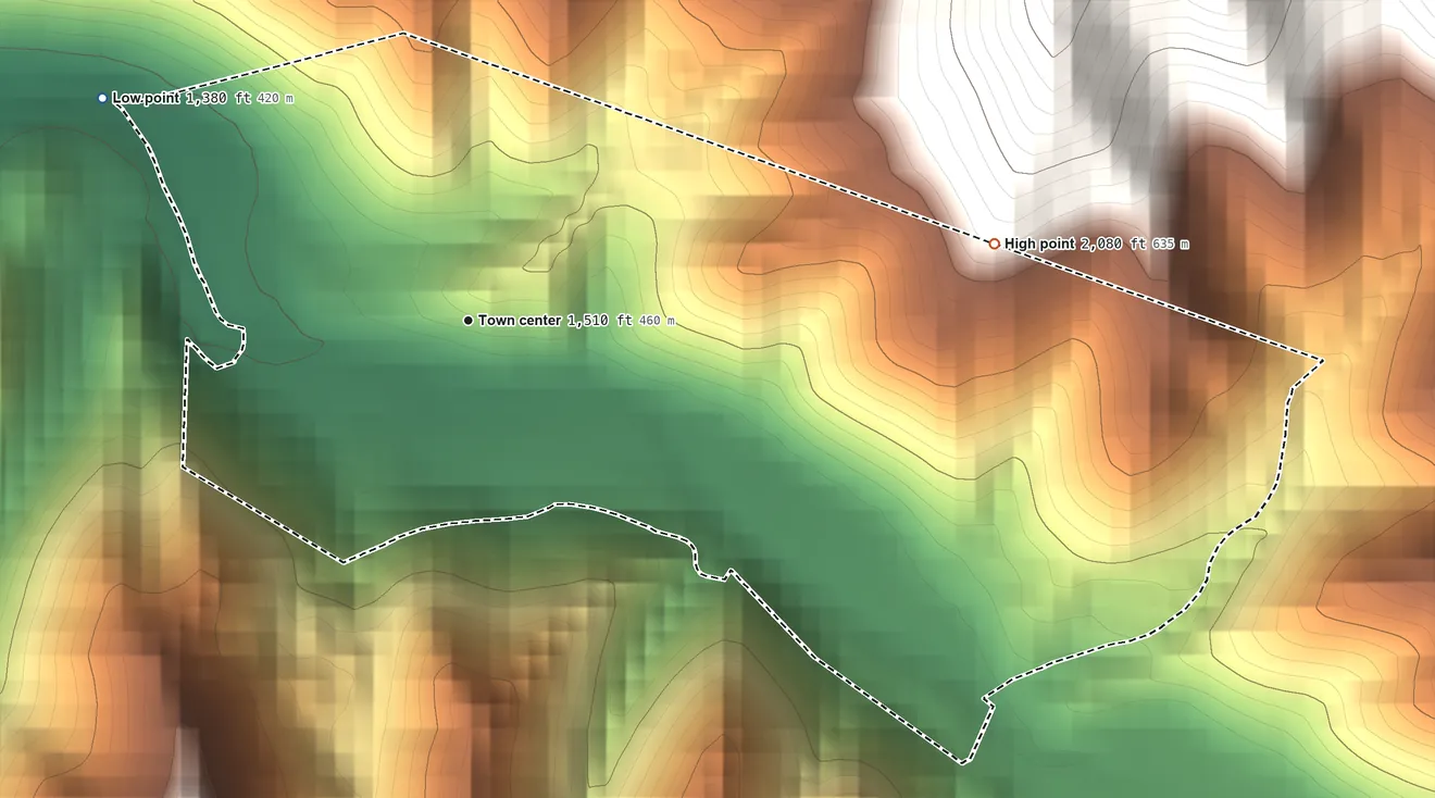 Topographic elevation map of Kenvir, Kentucky, shaded from 1,380 ft on the northwest side to 2,080 ft at the foot of the Pine Mountain