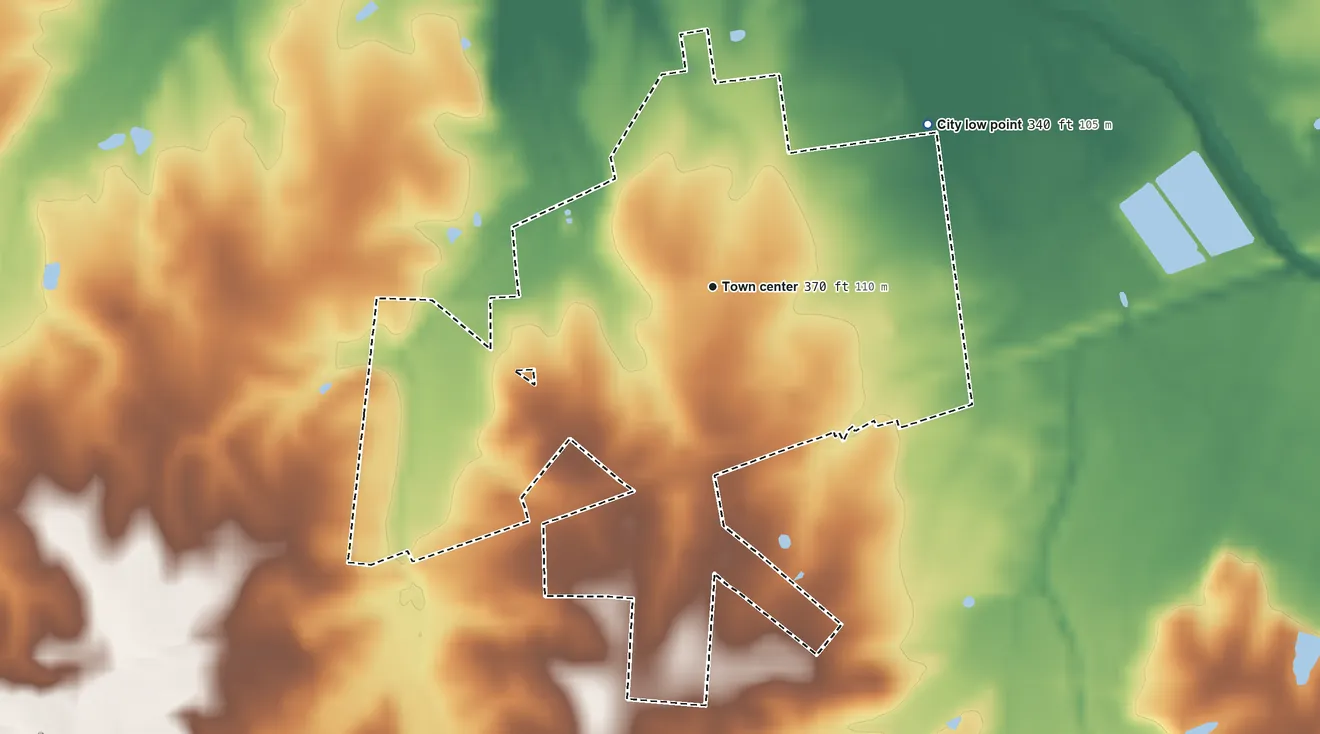 Topographic elevation map of La Center, Kentucky, shaded from 340 ft on the northeast side to 390 ft on the south side