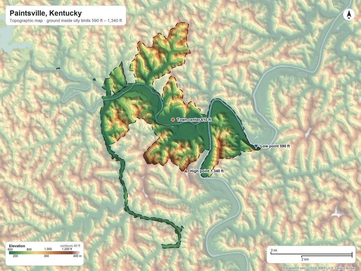 Topographic elevation map of Paintsville, Kentucky, shaded from 590 ft on the east side to 1,340 ft on the south side