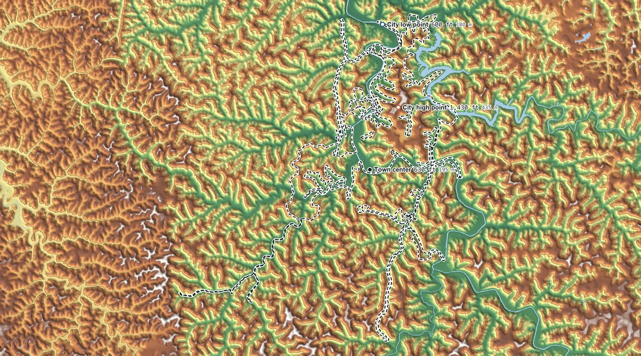 Topographic elevation map of Prestonsburg, Kentucky, shaded from 600 ft on the north side to 1,430 ft on the northeast side