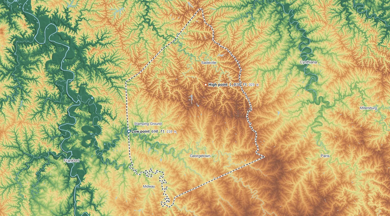 Topographic elevation map of Scott County, Kentucky, shaded from 690 ft on the west side to 1,070 ft on the northeast side