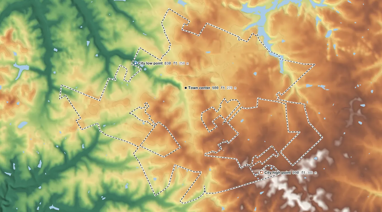 Topographic elevation map of Versailles, Kentucky, shaded from 830 ft on the northwest side to 990 ft on the southeast side