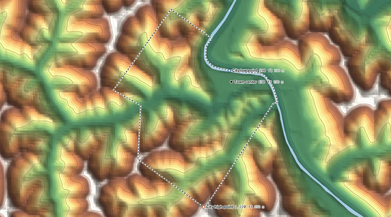 Topographic elevation map of Warfield, Kentucky, shaded from 590 ft near the middle to 1,220 ft on the south side