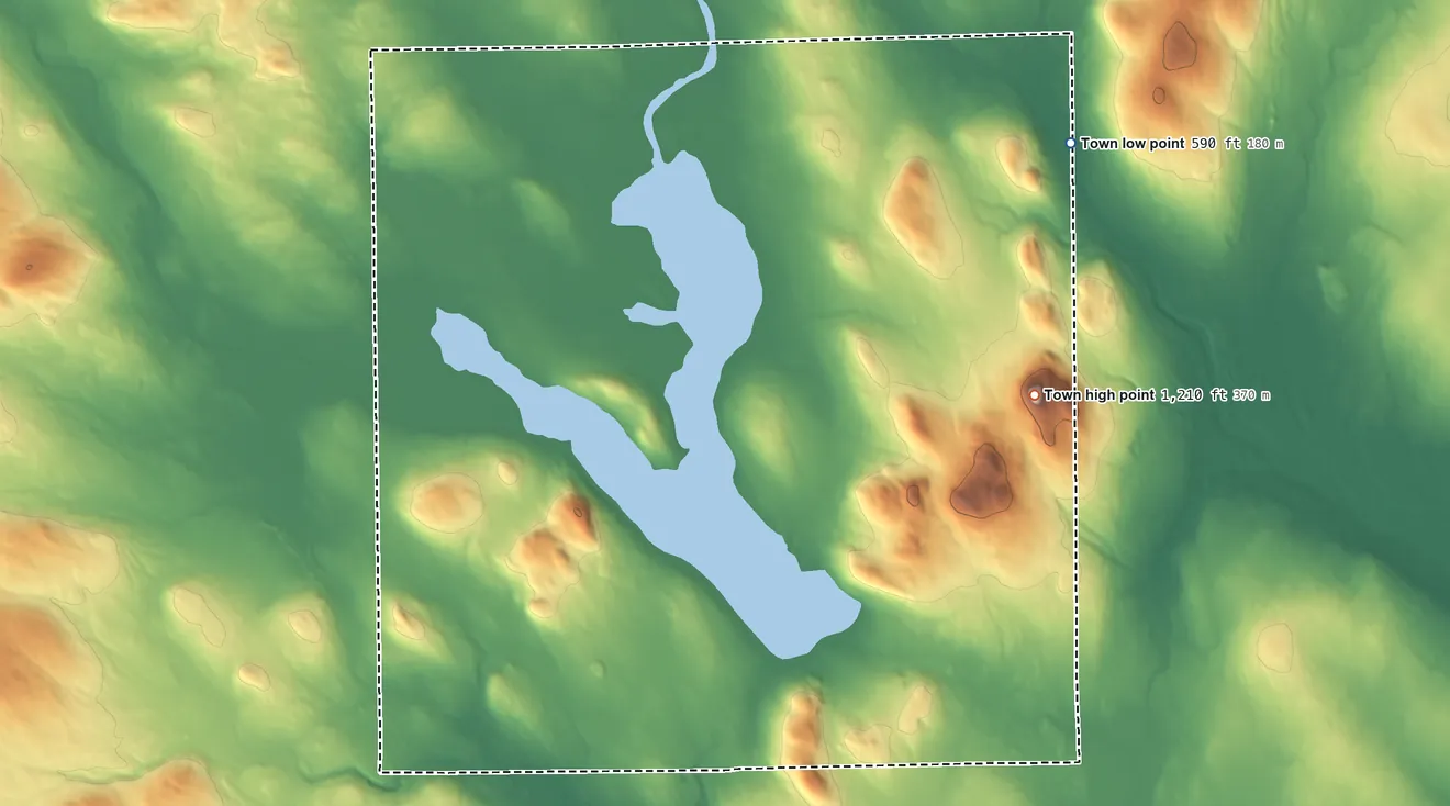 Topographic elevation map of Portage Lake, Maine, shaded from 590 ft on the northeast side to 1,210 ft on Lanigan Mountain