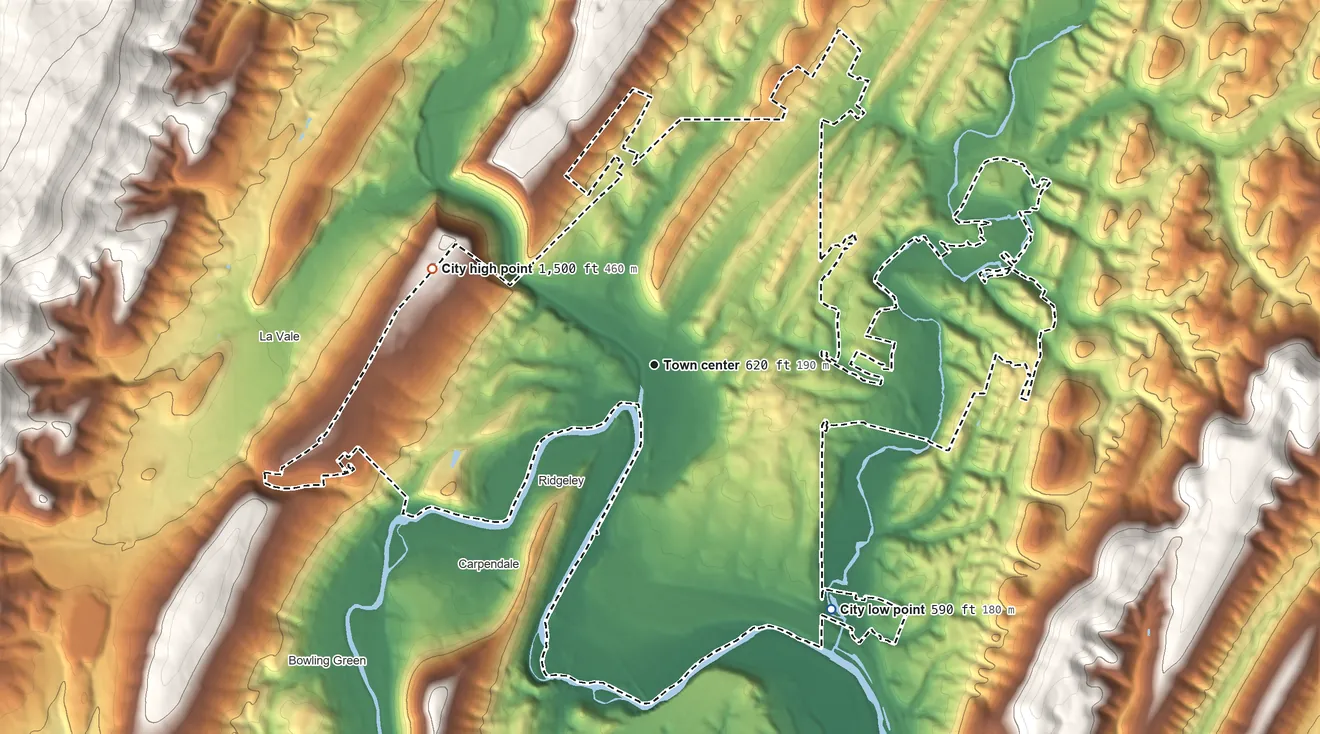 Topographic elevation map of Cumberland, Maryland, shaded from 590 ft on the southeast side to 1,500 ft on the northwest side
