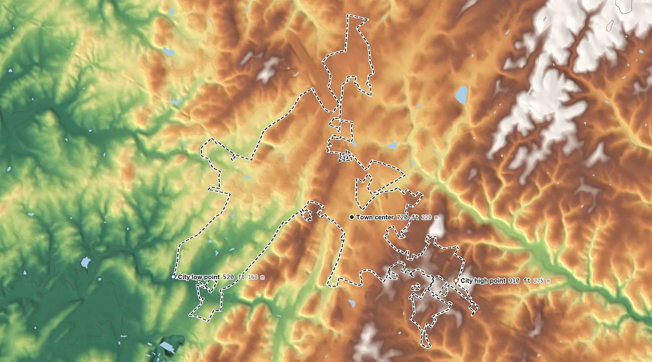 Topographic elevation map of Westminster, Maryland, shaded from 520 ft on the west side to 910 ft on the southeast side