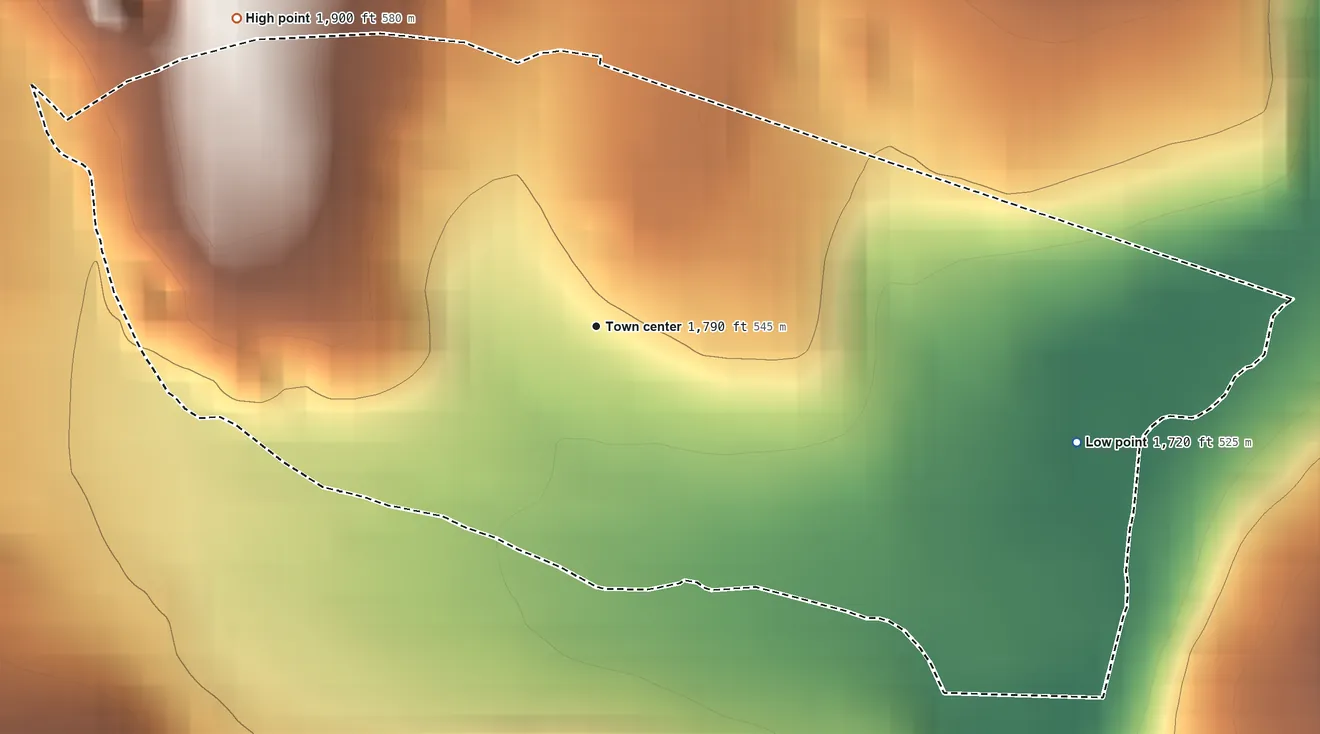 Topographic elevation map of Woodland, Maryland, shaded from 1,720 ft on the east side to 1,900 ft on the northwest edge, below higher ground just outside