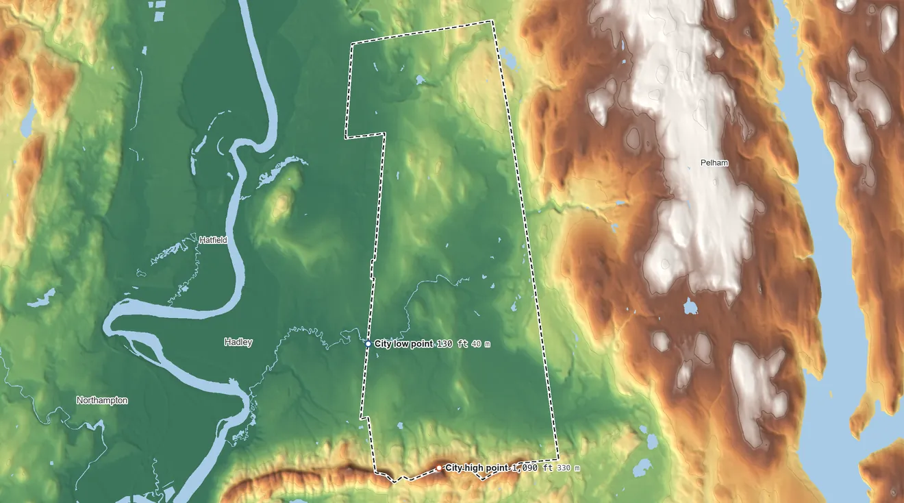 Topographic elevation map of Amherst Town, Massachusetts, shaded from 130 ft on the south side to 1,090 ft on the south edge, below higher ground just outside