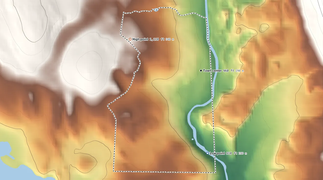 Topographic elevation map of Lenox Dale, Massachusetts, shaded from 910 ft on the south side to 1,110 ft at the foot of the Berkshire Hills