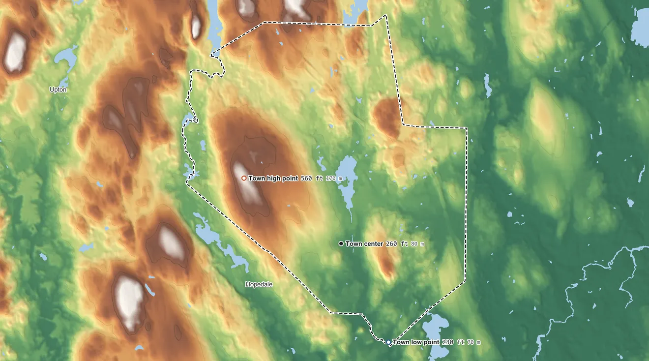 Topographic elevation map of Milford, Massachusetts, shaded from 230 ft on the southeast side to 560 ft on Magomiscock Hill