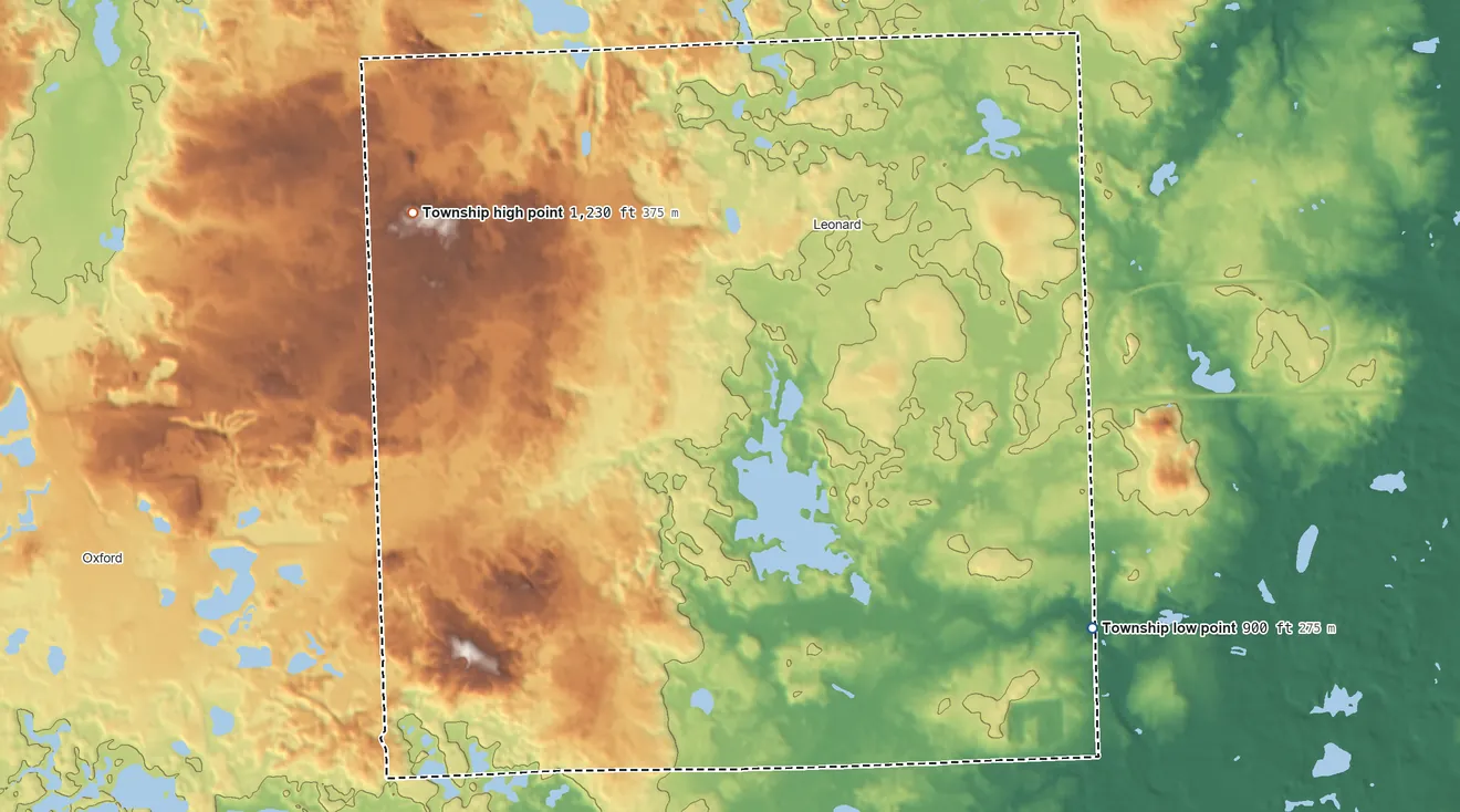 Topographic elevation map of Addison Township, Michigan, shaded from 900 ft on the southeast side to 1,230 ft on the northwest side