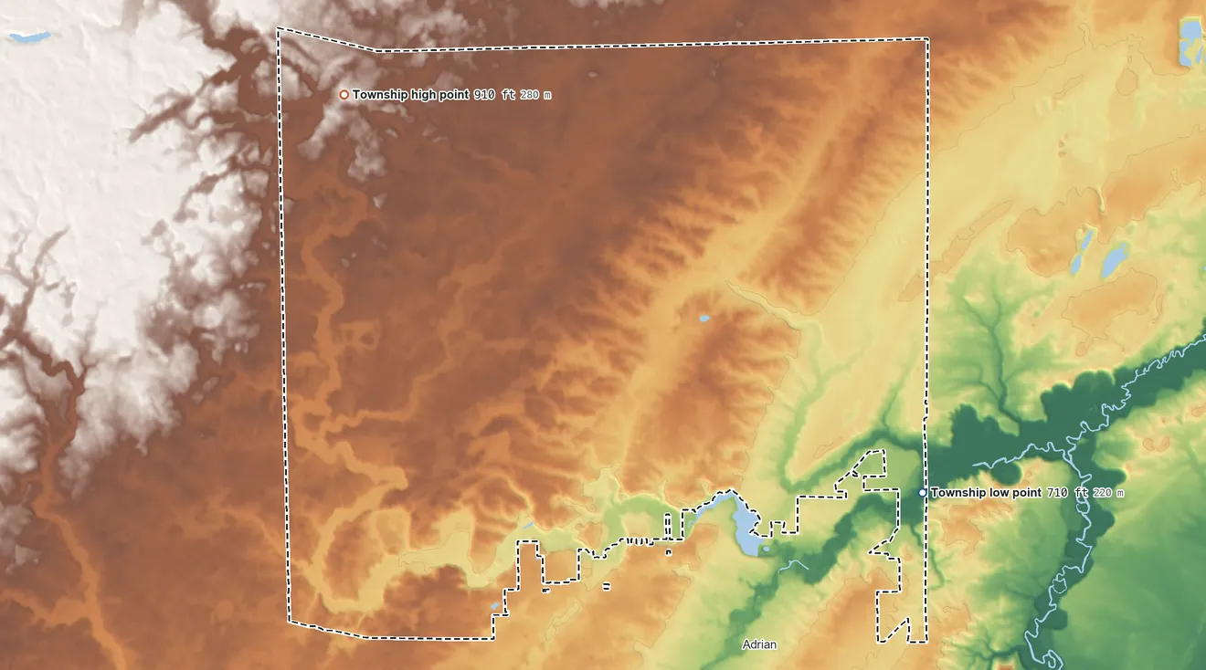 Topographic elevation map of Adrian Township, Michigan, shaded from 710 ft on the east side to 910 ft on the northwest side
