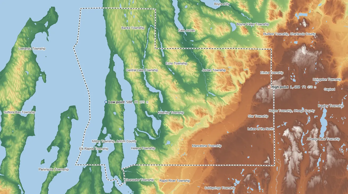 Topographic elevation map of Antrim County, Michigan, shaded from 580 ft on the west side to 1,480 ft on the east side
