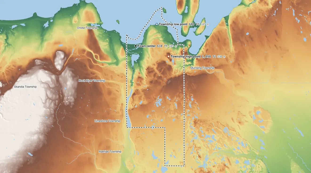 Topographic elevation map of Au Train Township, Michigan, shaded from 600 ft on the northeast side to 1,090 ft on the east side