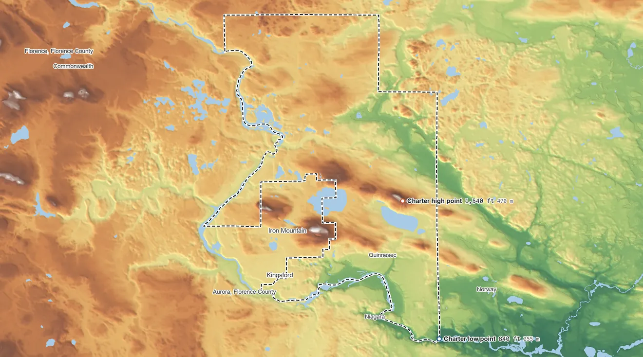 Topographic elevation map of Breitung Township, Michigan, shaded from 840 ft on the southeast side to 1,540 ft on the east side