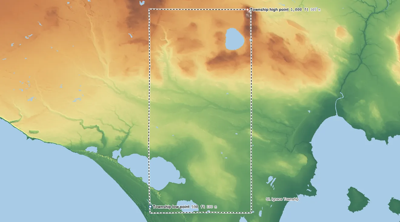 Topographic elevation map of Brevort Township, Michigan, shaded from 590 ft on the southwest side to 1,001 ft on Maple Hill