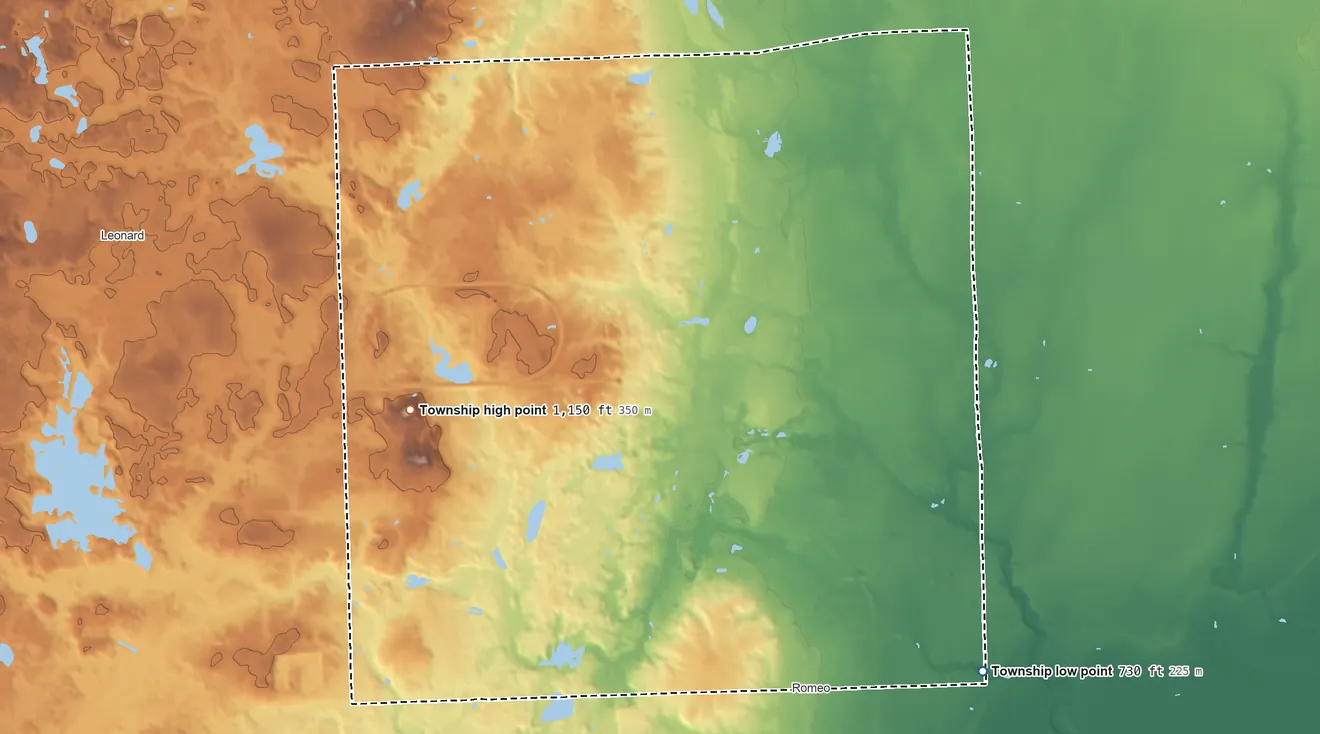 Topographic elevation map of Bruce Township, Michigan, shaded from 730 ft on the southeast side to 1,150 ft on Twombly Mountain