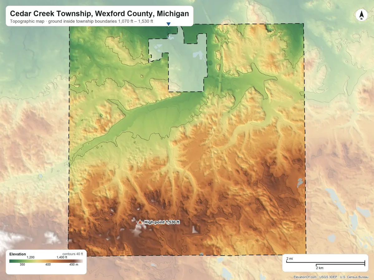 Topographic elevation map of Cedar Creek Township, Wexford County, Michigan, shaded from 1,070 ft on the north side to 1,530 ft on the south side