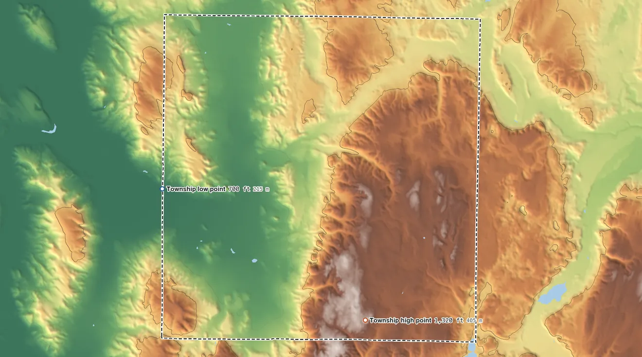 Topographic elevation map of Chandler Township, Charlevoix County, Michigan, shaded from 700 ft on the west side to 1,320 ft on the southeast side