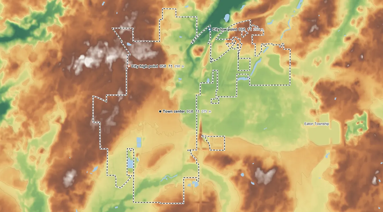 Topographic elevation map of Charlotte, Michigan, shaded from 860 ft on the northeast side to 950 ft on the northwest side
