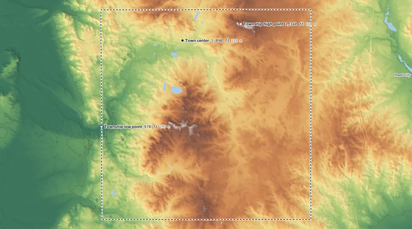 Topographic elevation map of Chase Township, Michigan, shaded from 970 ft on the southwest side to 1,340 ft on the east side