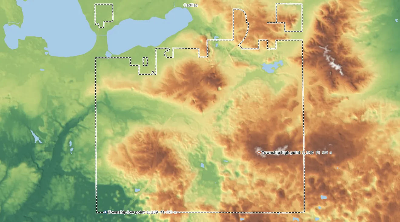 Topographic elevation map of Clam Lake Township, Michigan, shaded from 1,230 ft on the southwest side to 1,540 ft on the southeast side