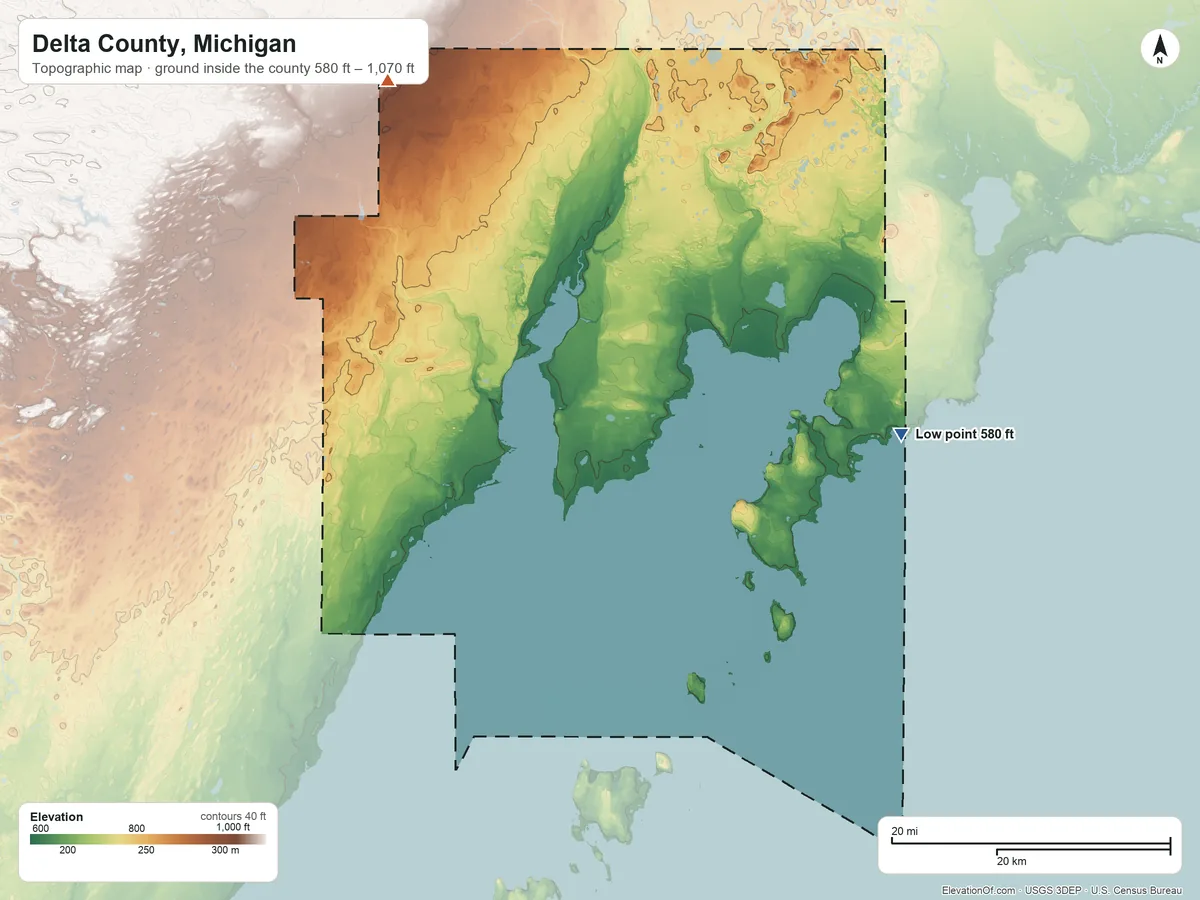 Topographic elevation map of Delta County, Michigan, shaded from 580 ft on the shore of Lake Michigan to 1,070 ft on the northwest side