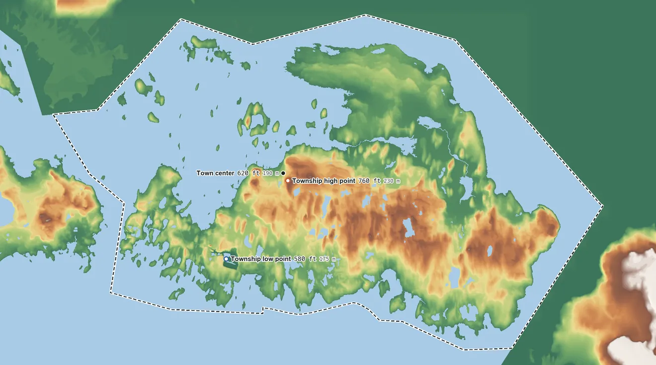 Topographic elevation map of Drummond Township, Michigan, shaded from 580 ft on the shore of Lake Huron to 760 ft near the middle