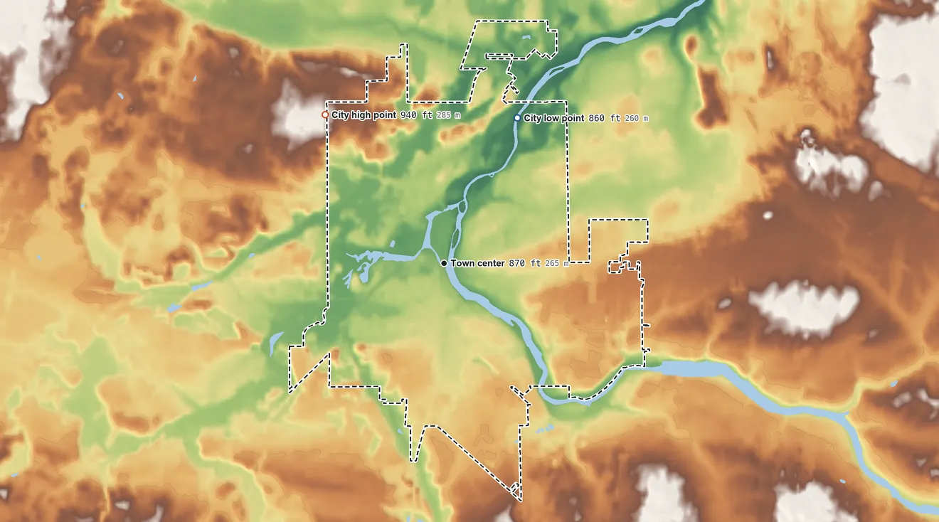 Topographic elevation map of Eaton Rapids, Michigan, shaded from 860 ft on the northeast side to 940 ft on the northwest side