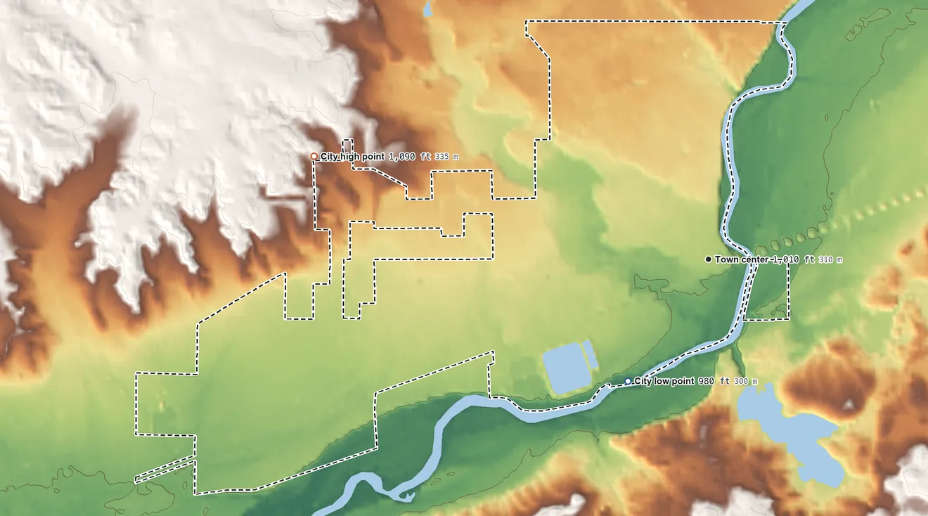 Topographic elevation map of Evart, Michigan, shaded from 980 ft on the southwest side to 1,090 ft on the west side