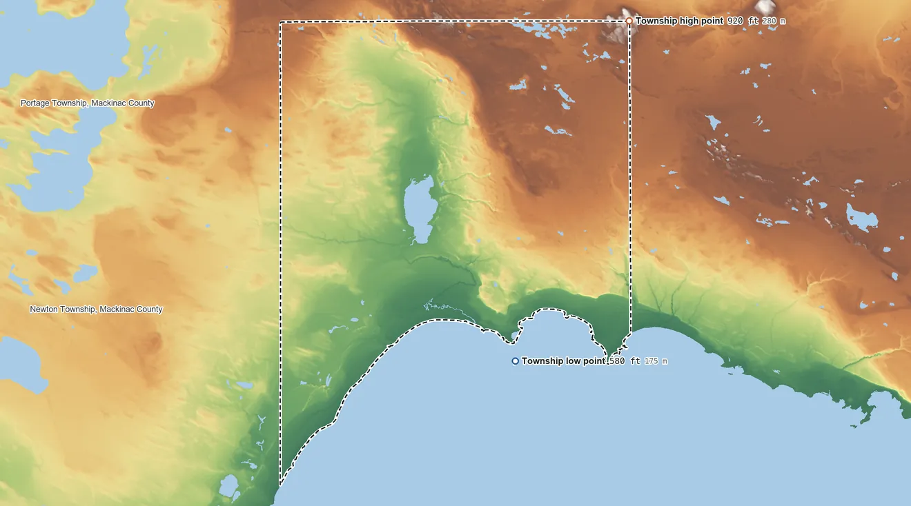 Topographic elevation map of Garfield Township, Mackinac County, Michigan, shaded from 580 ft on the southeast side to 920 ft on the northeast side