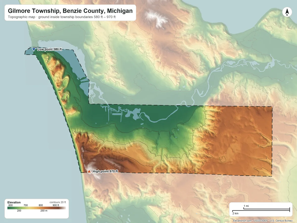Topographic elevation map of Gilmore Township, Benzie County, Michigan, shaded from 580 ft on the northwest side to 970 ft on the southwest side