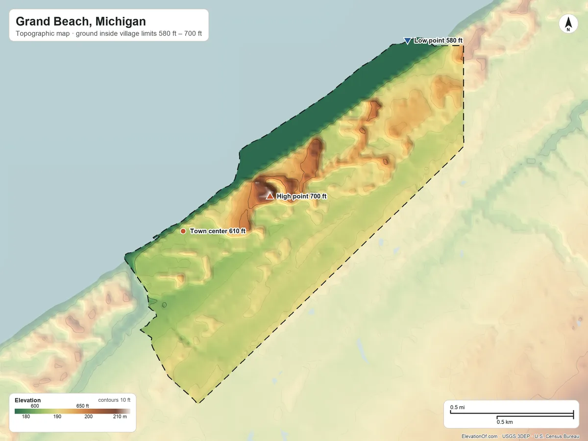 Topographic elevation map of Grand Beach, Michigan, shaded from 580 ft on the northeast side to 700 ft on the east side