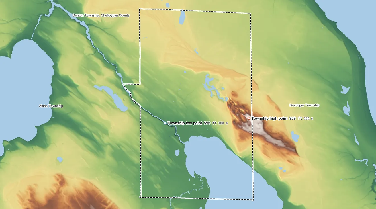 Topographic elevation map of Grant Township, Cheboygan County, Michigan, shaded from 590 ft near the middle to 930 ft on the east side