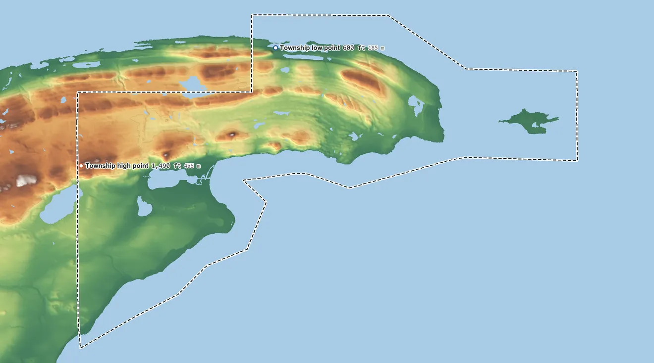 Topographic elevation map of Grant Township, Keweenaw County, Michigan, shaded from 600 ft on the northeast side to 1,490 ft on Gratiot Mountain