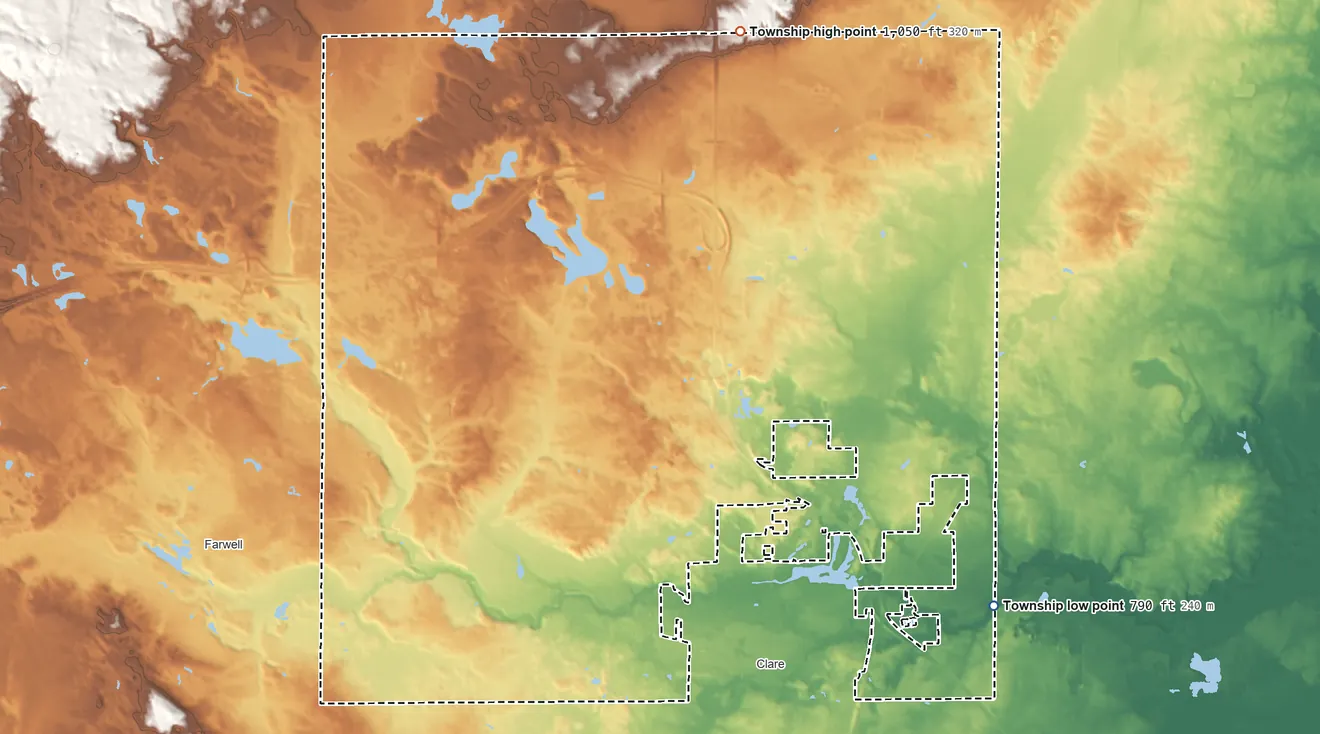 Topographic elevation map of Grant Township, Michigan, shaded from 790 ft on the southeast side to 1,050 ft on the north side
