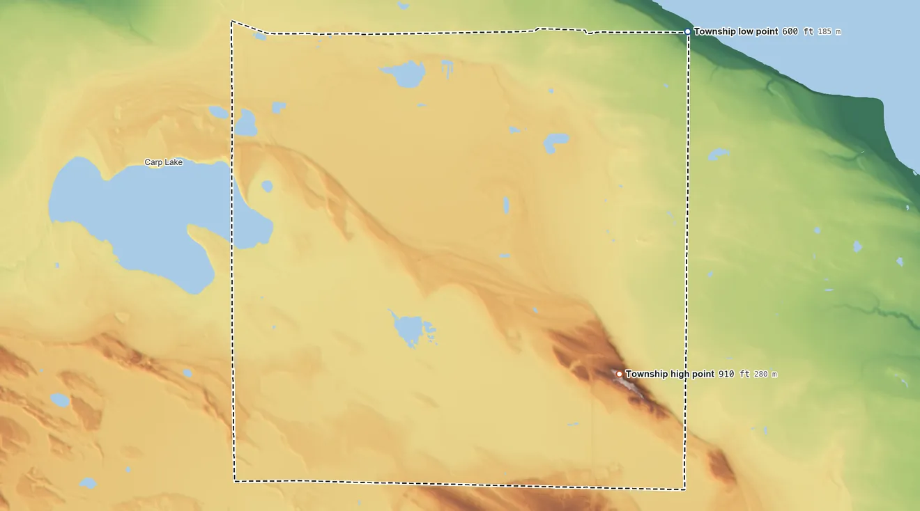 Topographic elevation map of Hebron Township, Michigan, shaded from 600 ft on the northeast side to 910 ft on the southeast side