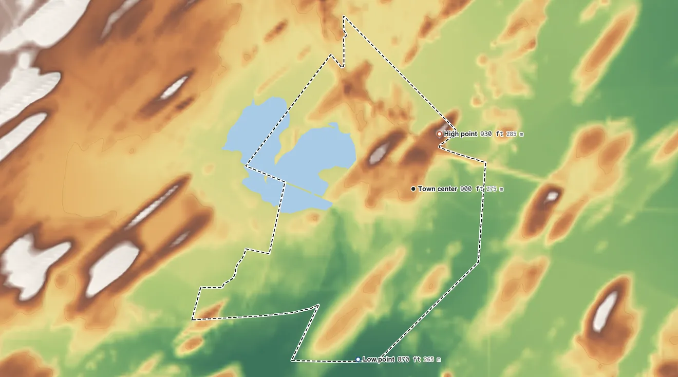 Topographic elevation map of Hermansville, Michigan, shaded from 870 ft on the south side to 930 ft on the northeast side