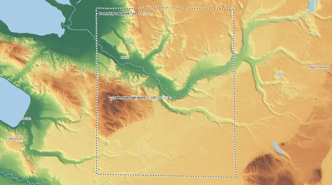 Topographic elevation map of Homestead Township, Michigan, shaded from 590 ft on the northwest side to 1,100 ft on the west side