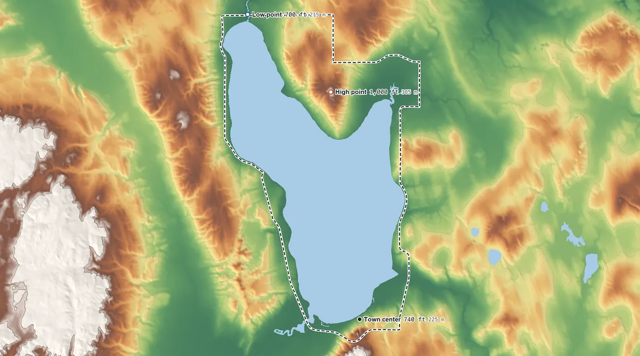 Topographic elevation map of Hubbard Lake, Michigan, shaded from 700 ft on the north side to 1,000 ft on Hickey Hill