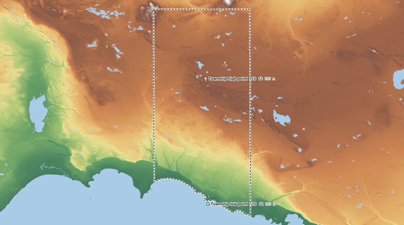 Topographic elevation map of Hudson Township, Mackinac County, Michigan, shaded from 580 ft on the south side to 940 ft on the north side