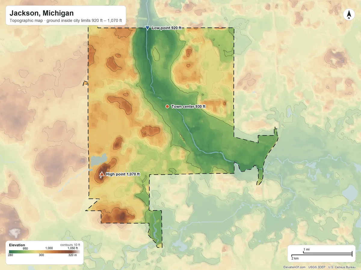 Topographic elevation map of Jackson, Michigan, shaded from 920 ft on the north side to 1,070 ft on the southwest side