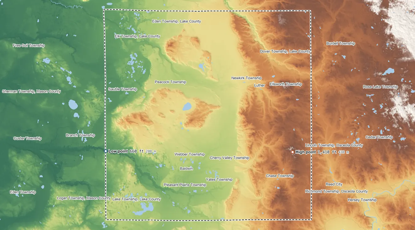 Topographic elevation map of Lake County, Michigan, shaded from 660 ft on the west side to 1,410 ft on the southeast side