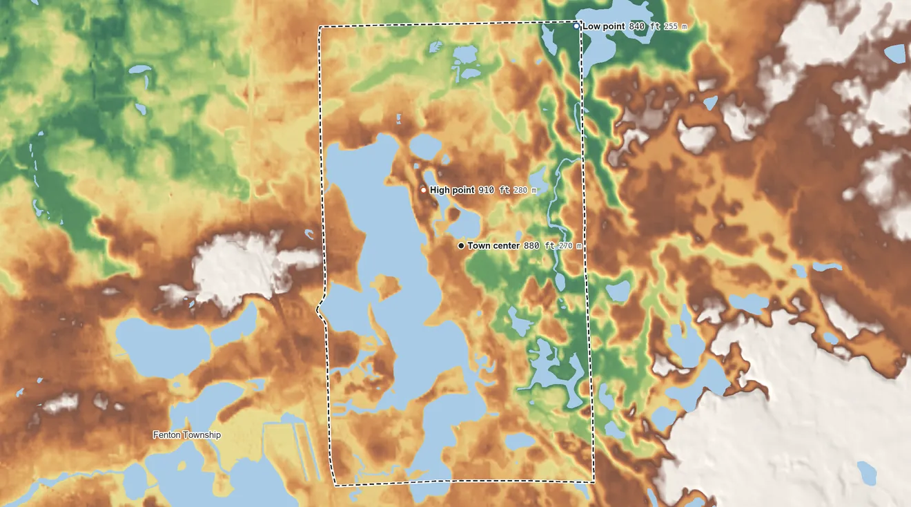 Topographic elevation map of Lake Fenton, Michigan, shaded from 840 ft on the northeast side to 910 ft on the northwest side