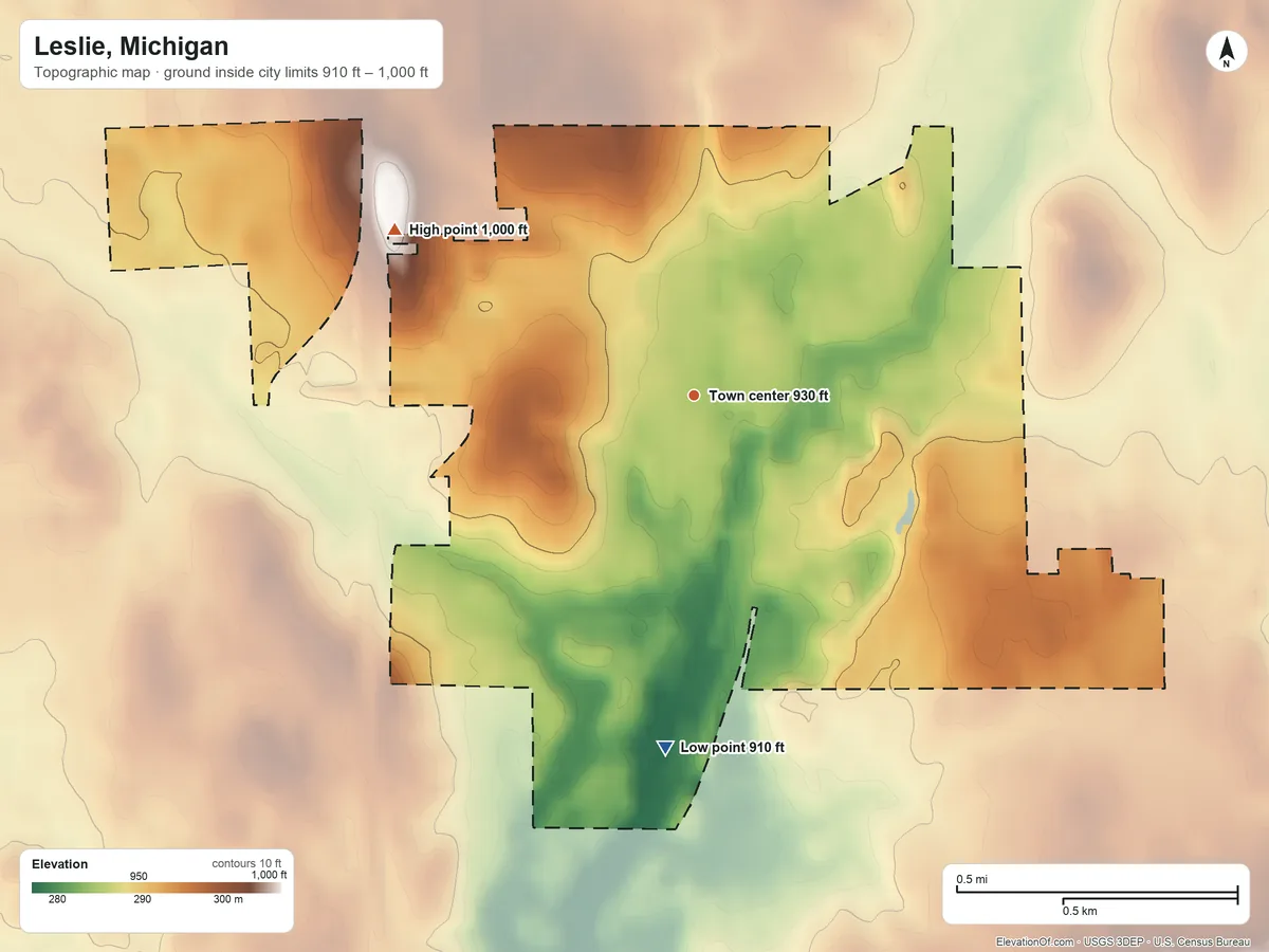 Topographic elevation map of Leslie, Michigan, shaded from 910 ft on the south side to 1,000 ft on the northwest side